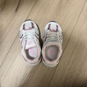 New Balance Pink and White Sneakers with Cushioned Sole